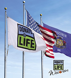 3 fully waving flags: Donate Life, United States and State of Wisconsin